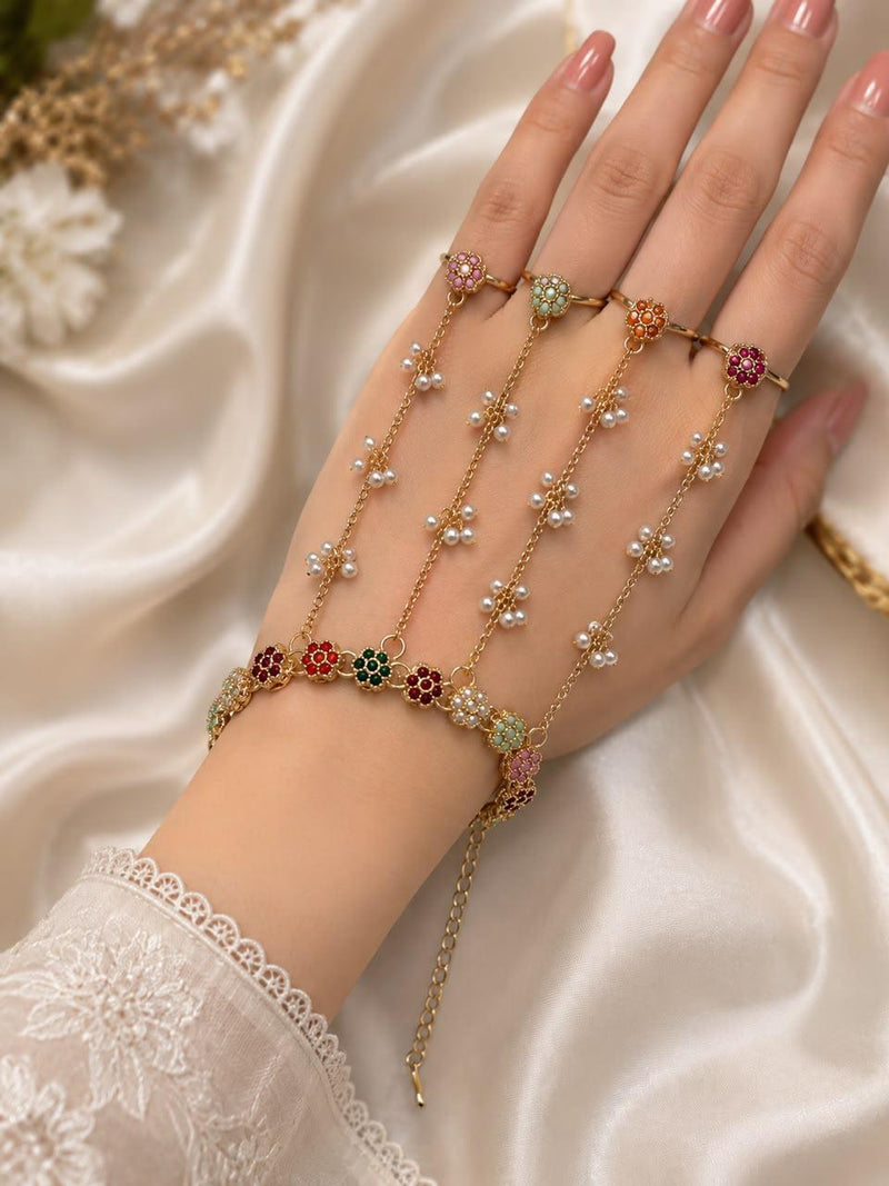 Adjustable gold-tone four-ring hand bracelet with multicolor floral stones and pearl chain details