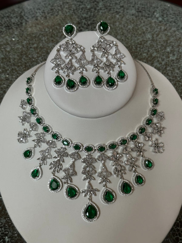 Emerald green American diamond necklace and earring set in silver finish
