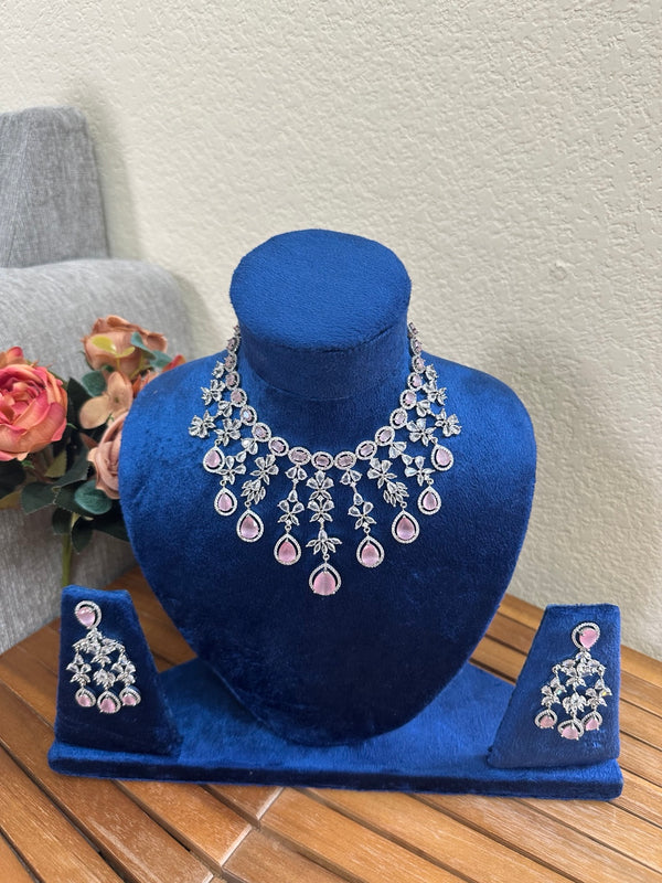 Pink American diamond necklace and earring set in silver finish