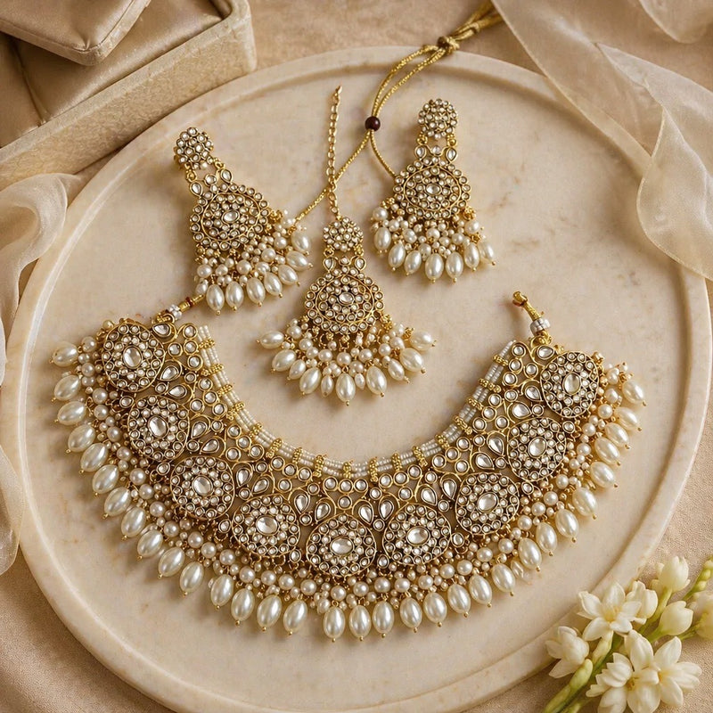 Gold American diamond pearl bridal necklace set with earrings and tikka