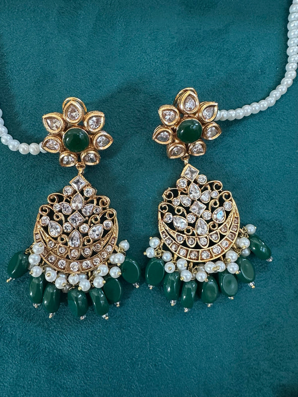 Emerald green kundan chandbali earrings with pearl drops and gold tone finish