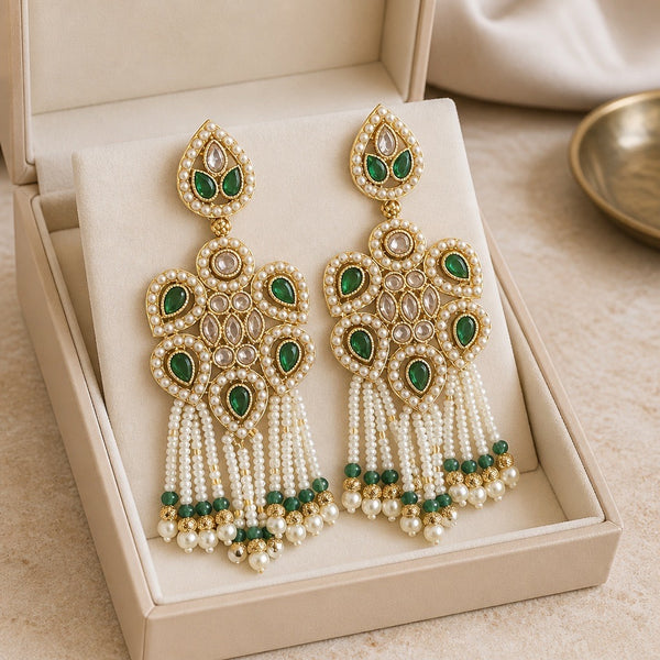 Emerald green pearl Kundan statement earrings with tassel drops