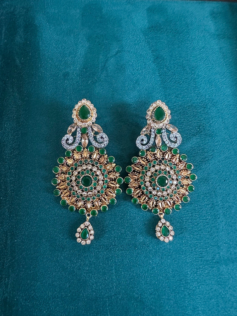 Emerald green statement chandbali earrings with gold tone and crystal detailing
