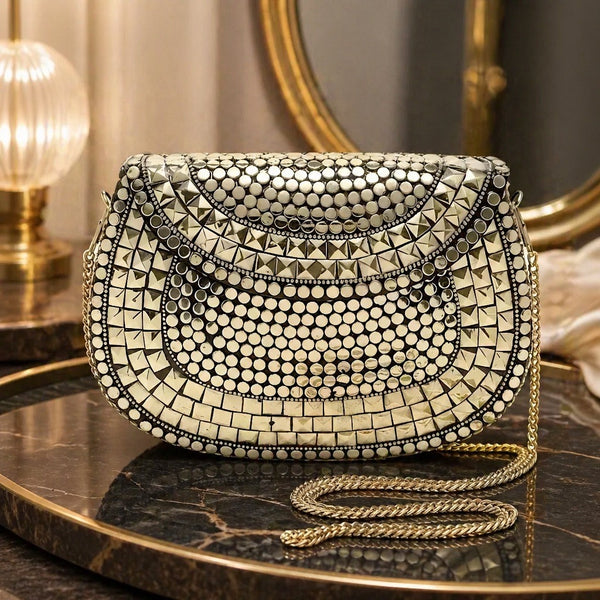 Handcrafted metal mirror clutch with gold chain strap and black velvet lining