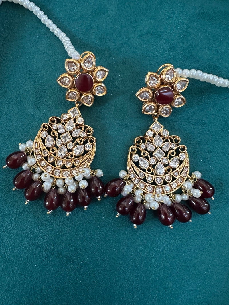 Garnet kundan chandbali earrings with gold tone finish and pearl drops