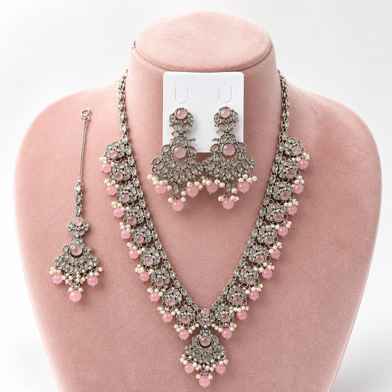 Pink silver Kundan necklace set with earrings and tikka