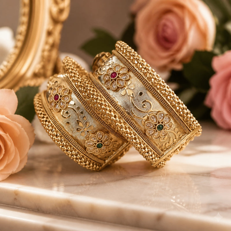 Rajwari gold-tone floral bangle set with red and green stone accents