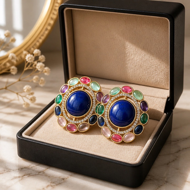 Round statement stud earrings with royal blue center stone and multicolor accents