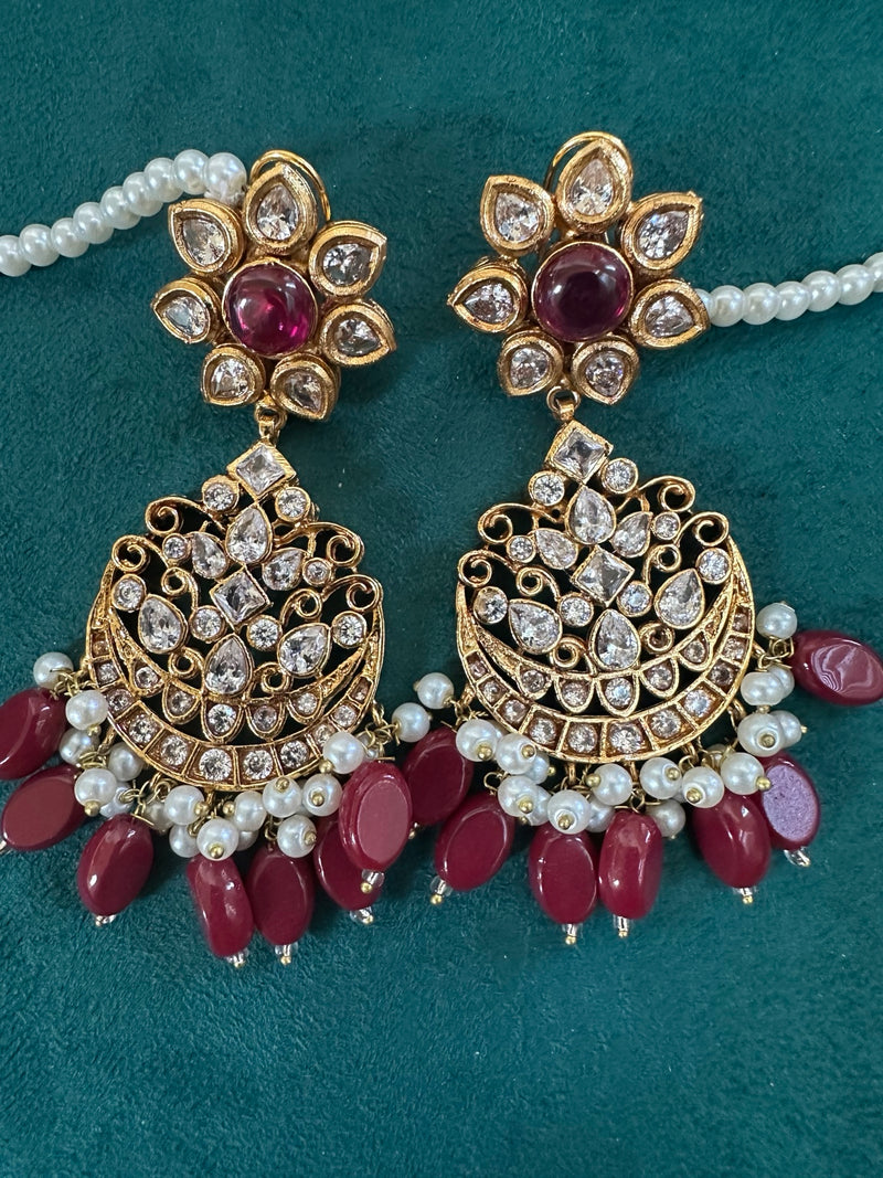 Ruby color kundan chandbali earrings close detail with faux pearls