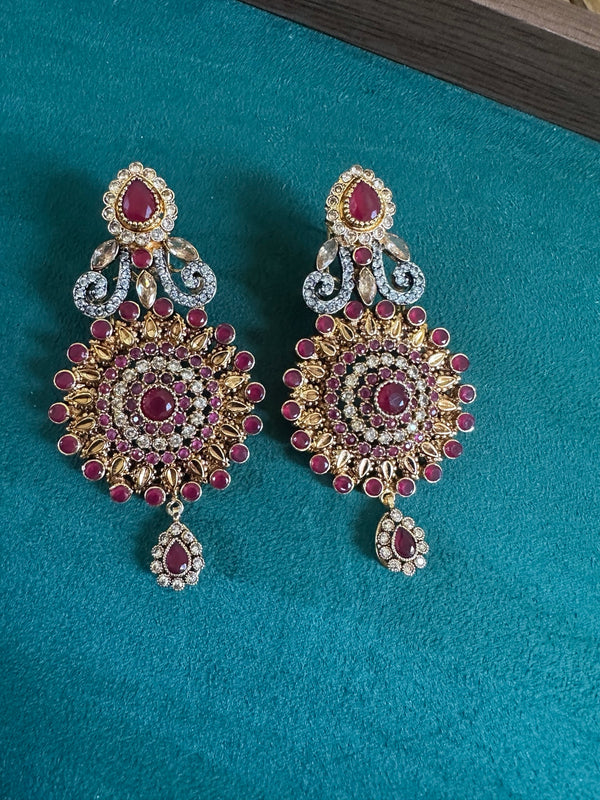 Ruby statement chandbali earrings close view with teardrop charm