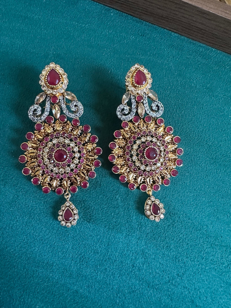 Ruby statement chandbali earrings close view with teardrop charm