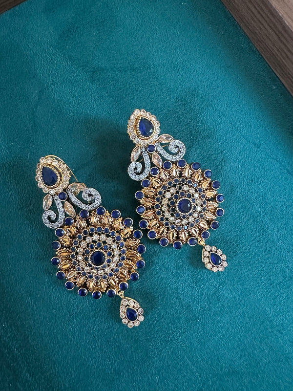 Sapphire blue kundan style statement earrings angled view