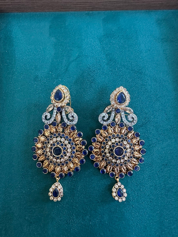 Sapphire blue statement chandbali earrings with gold tone and crystal details